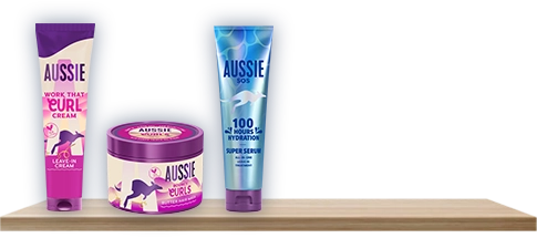 Étagère avec les produits Aussie